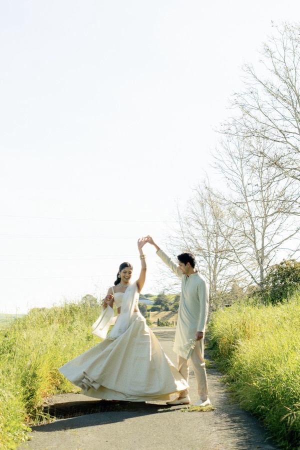 Subhiksha and Naren dancing together outdoors
